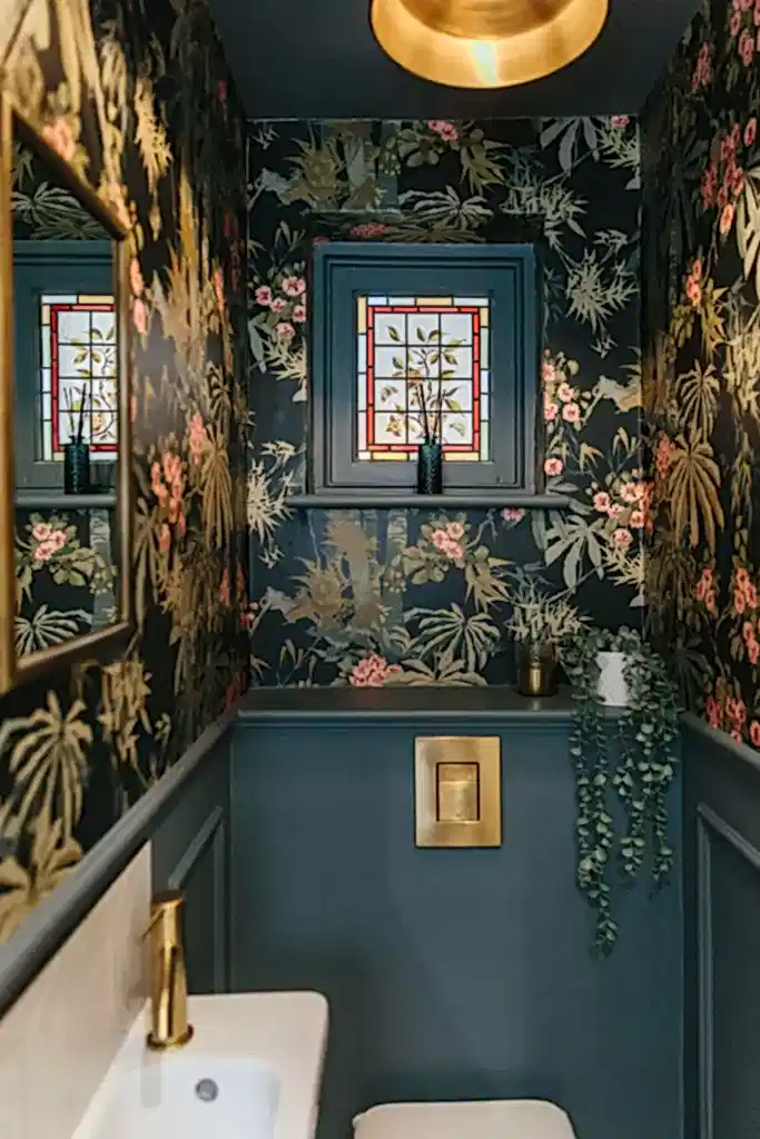 Wallpaper above panelling in cloakroom