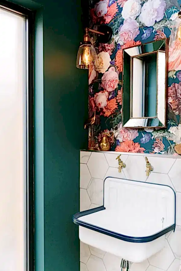 Small cloakroom bathroom with floral wallpaper