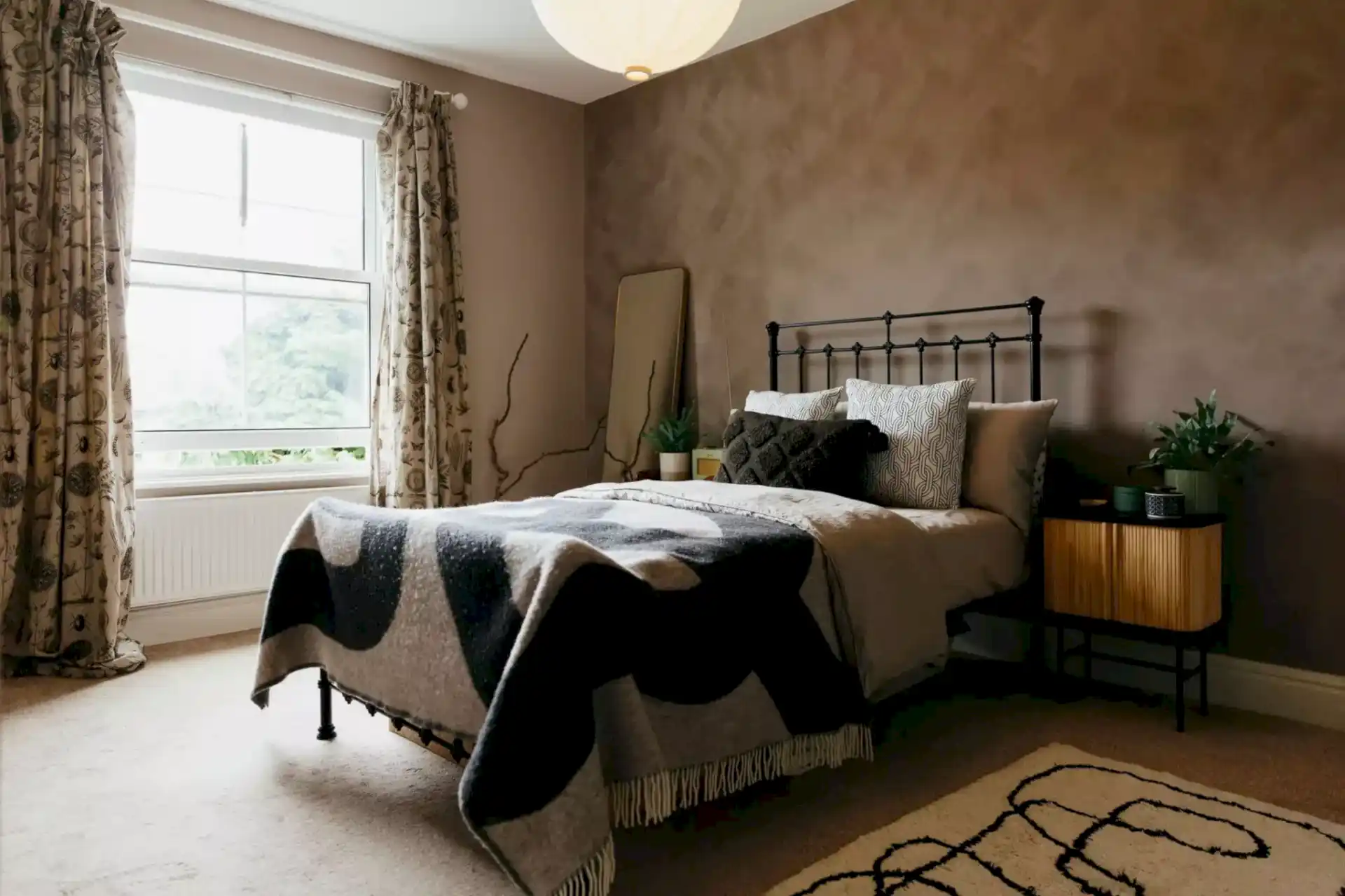 Warm modern greige & black bedroom