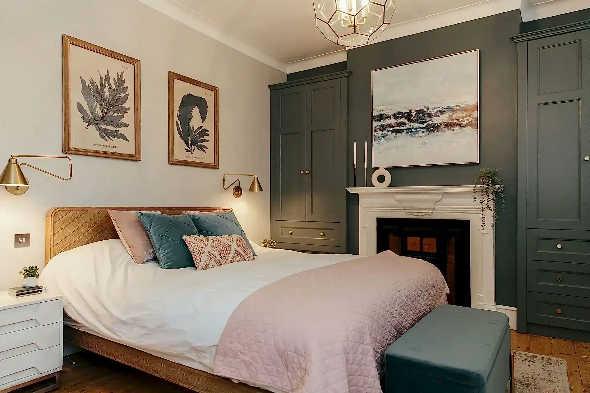 Victorian home | Pink and blue bedroom with fitted fireplace alcove storage