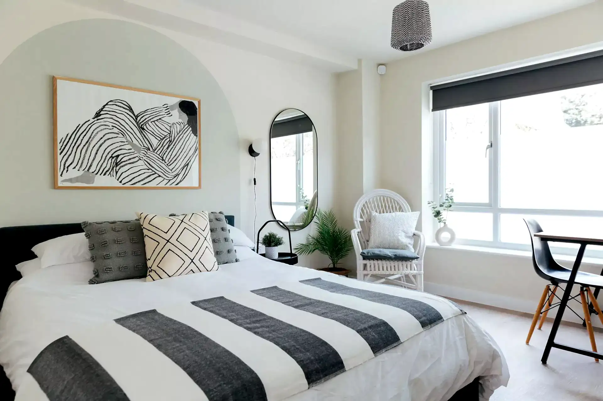 Monochromatic bedroom with painted headboard
