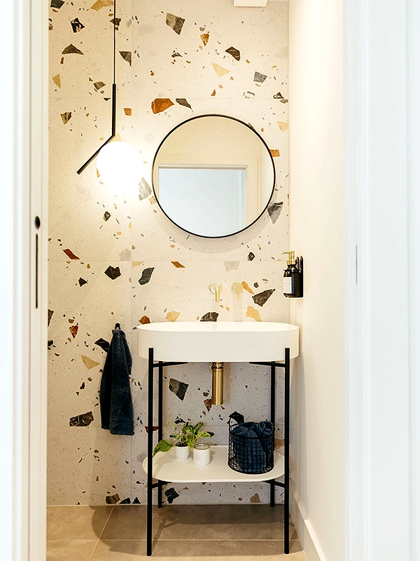 Terrazzo style bathroom with minimalist furniture