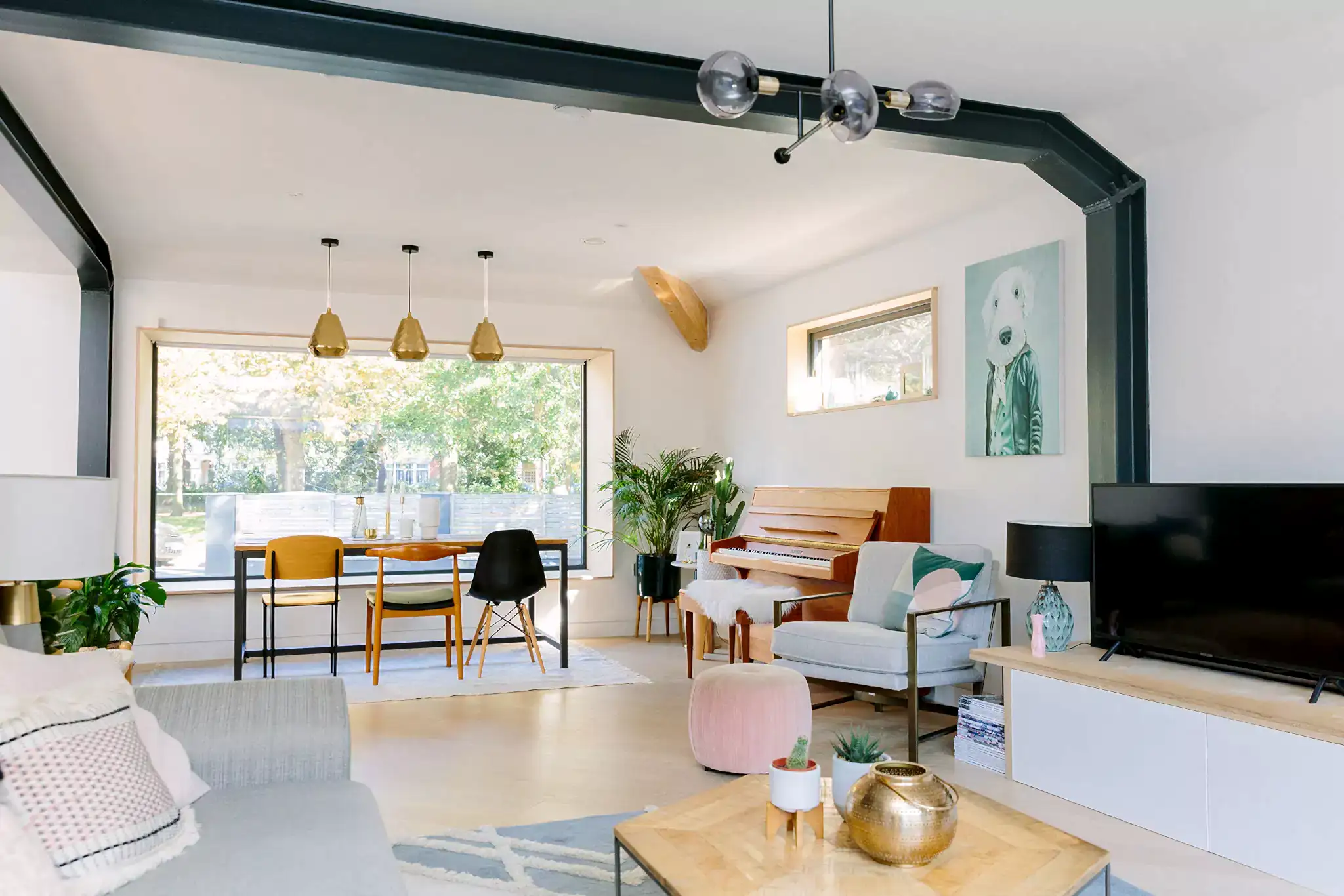 Open plan space with exposed industrial beams