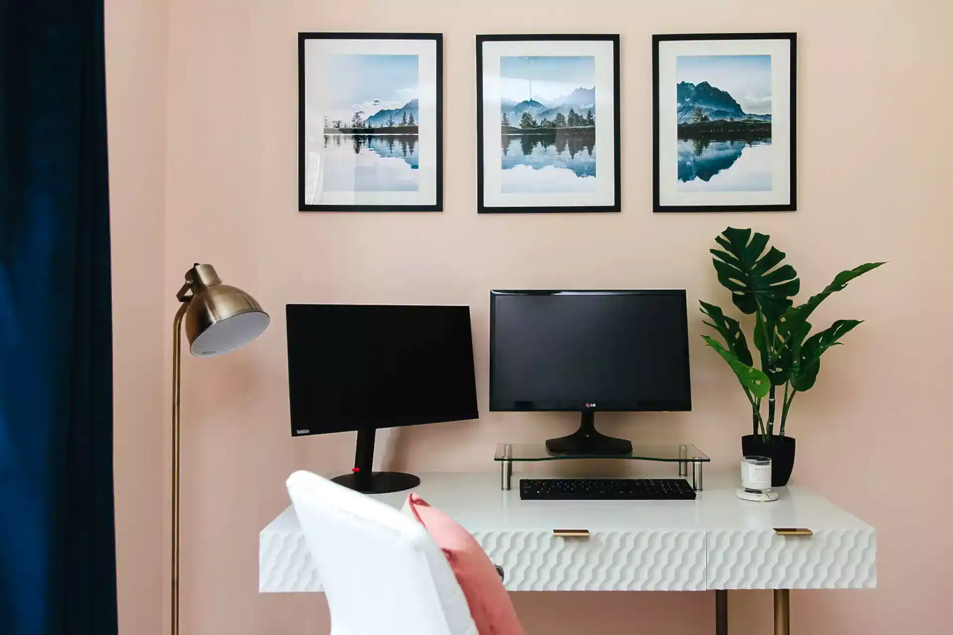 Pink home office with gallery wall