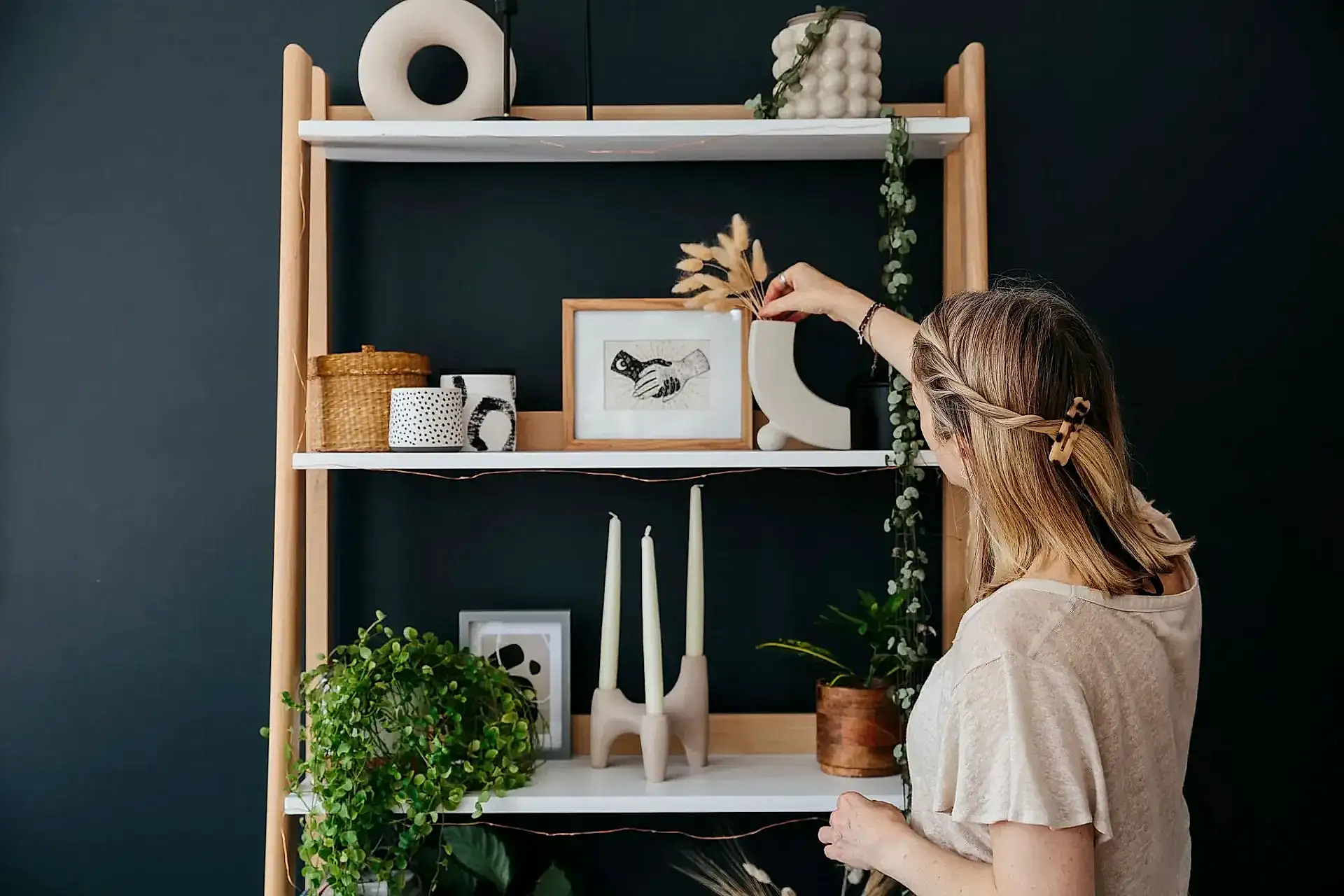 Dark and natural shelf styling