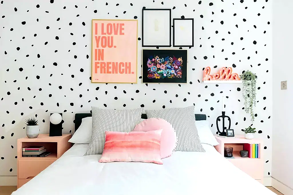 Layering gallery wall over wallpaper