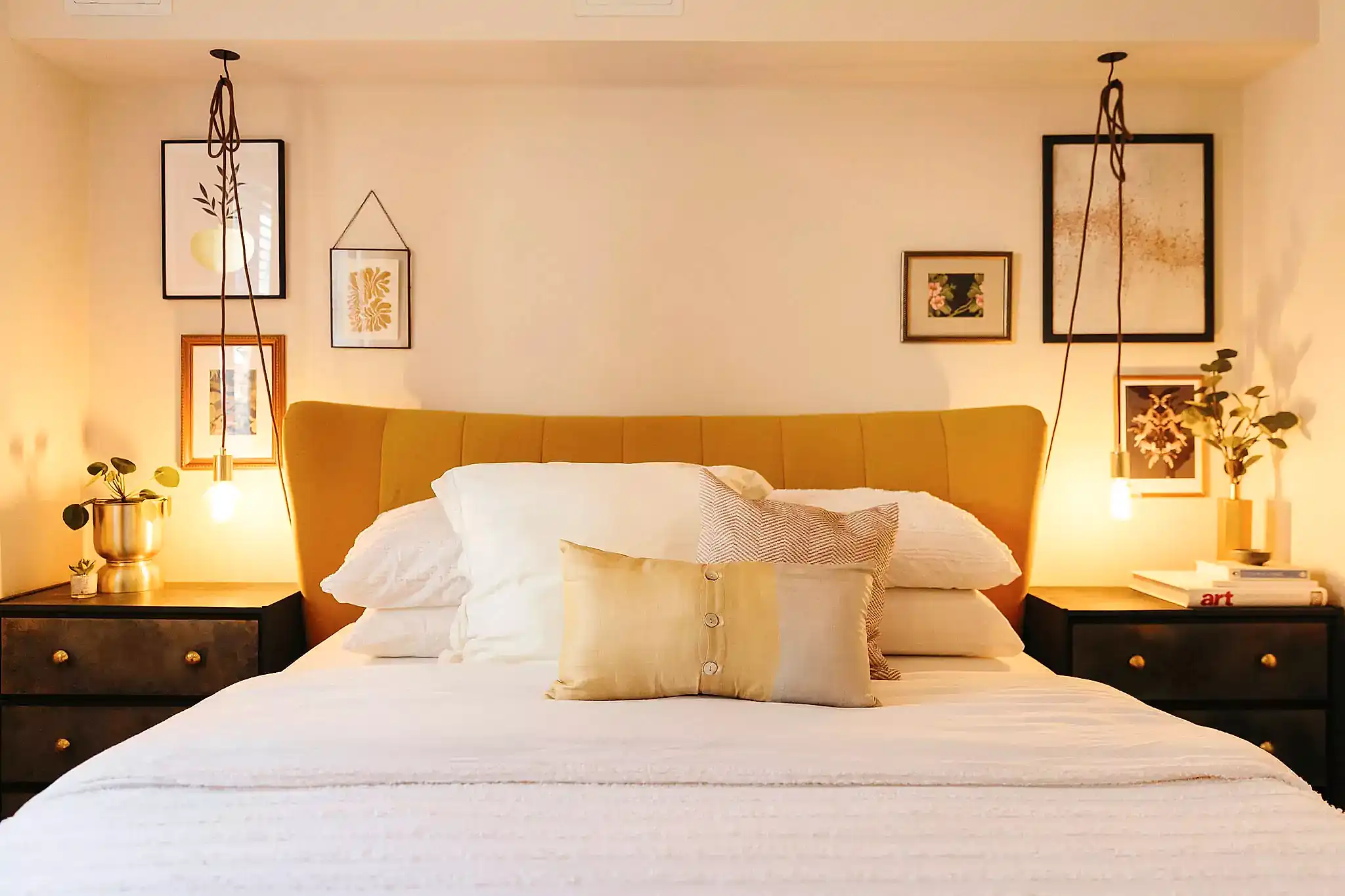 cosy neutral bedroom with pendant lights