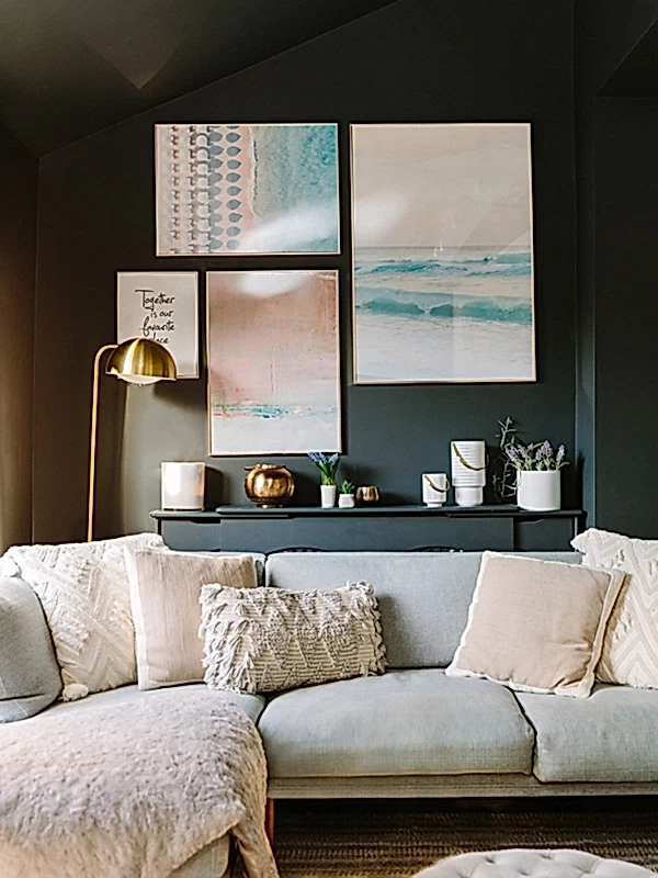 Dark grey painted living room with gallery wall