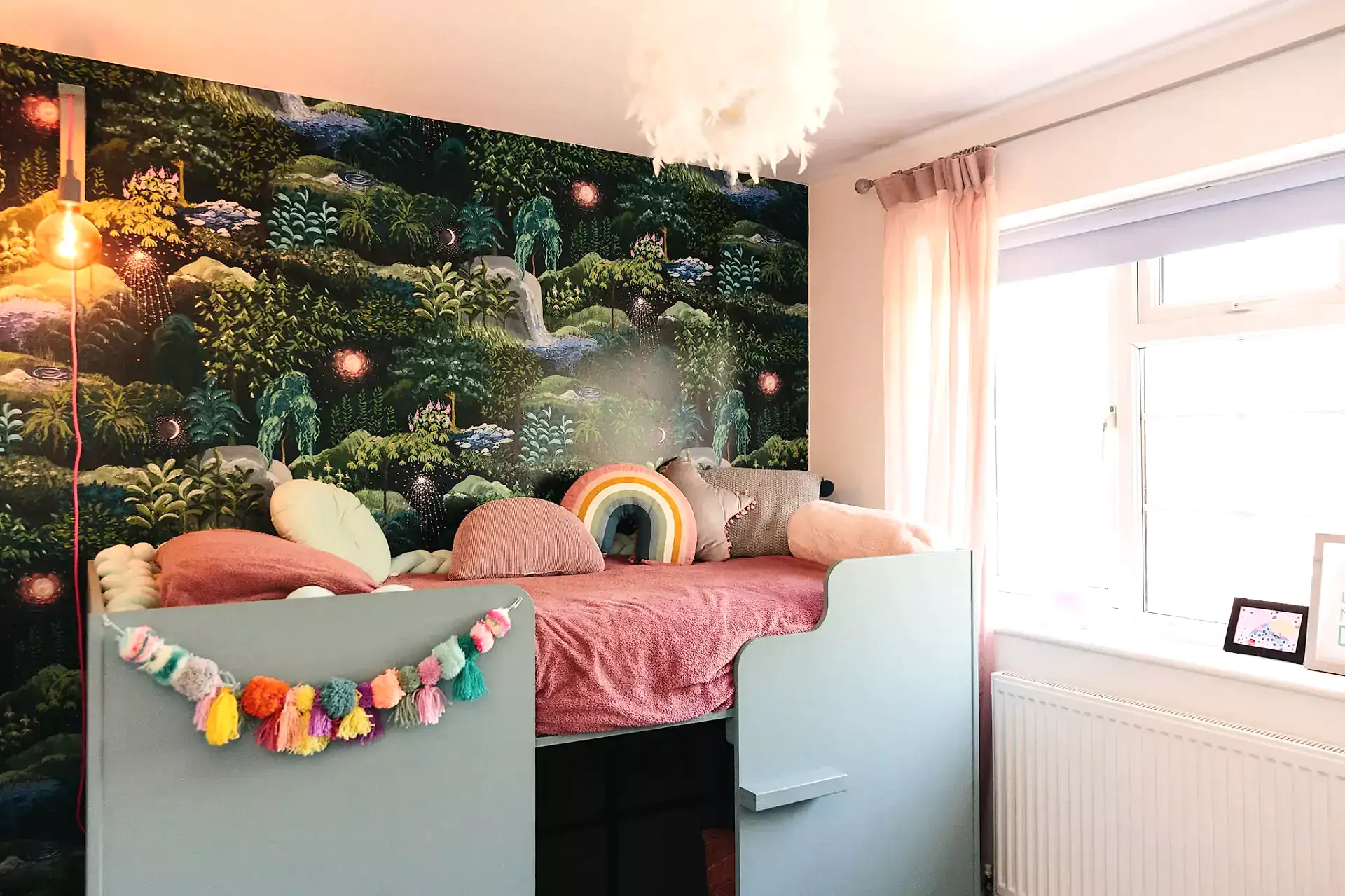 Childrens bedroom with wallpaper feature wall