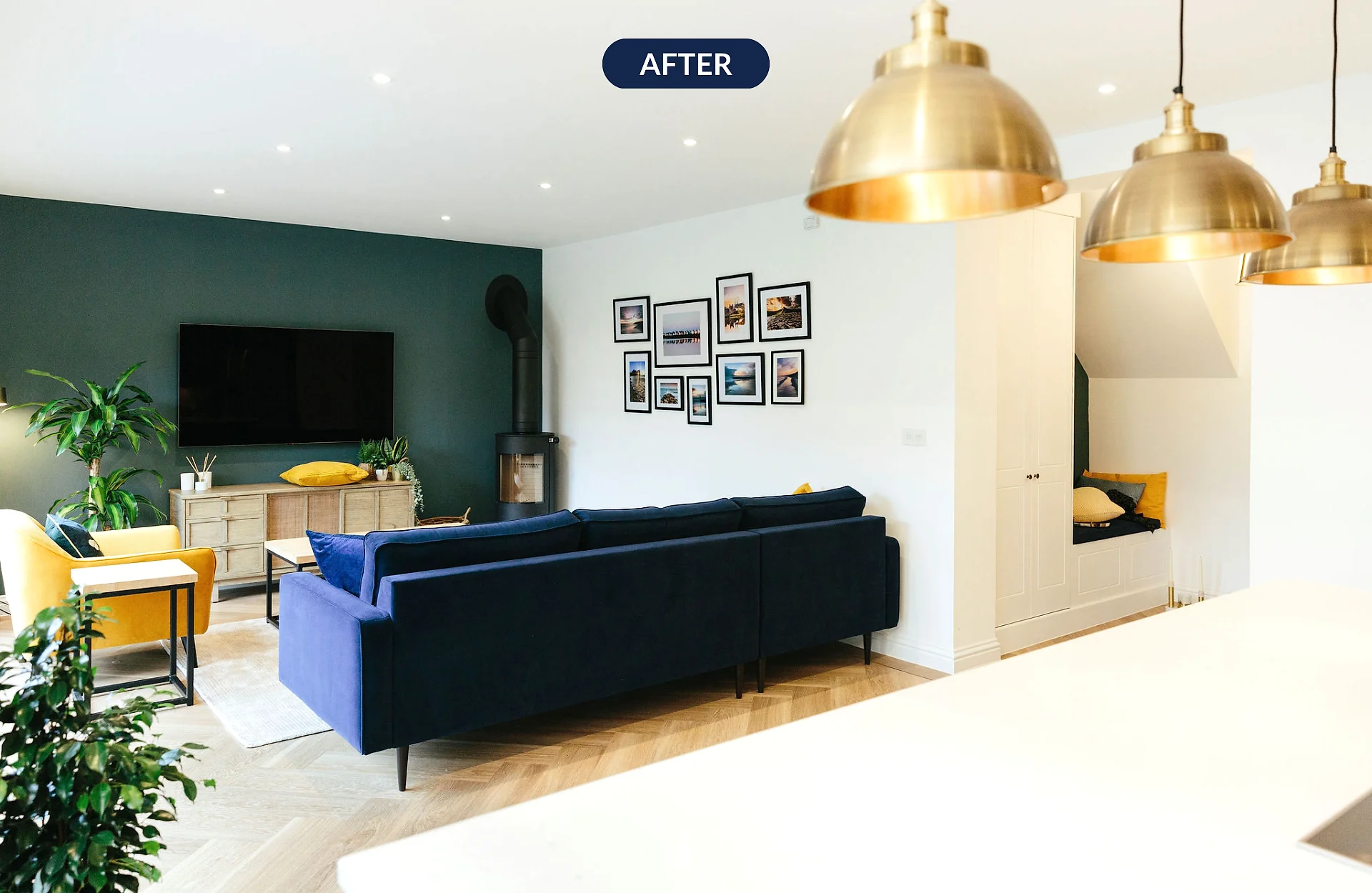 Open plan living space with teel feature wall