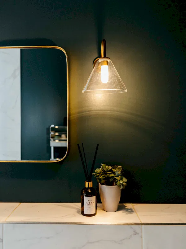 Dark painted bathroom with white marble tiles | Downstairs toilet ideas