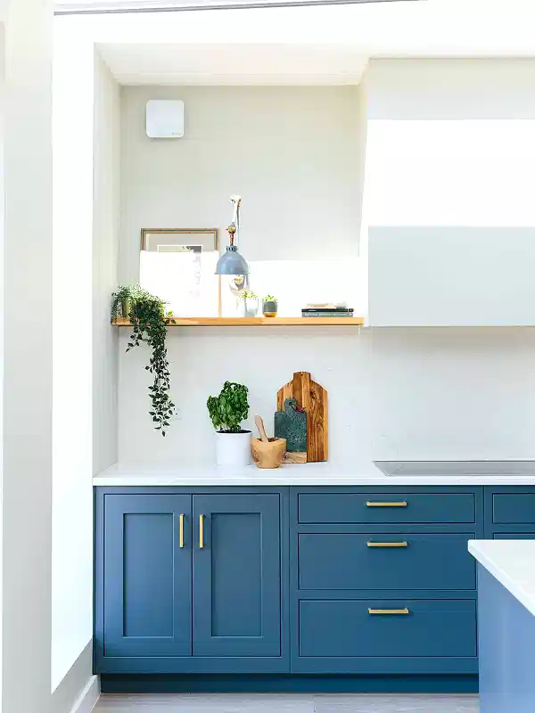 matte blue kitchen with white marble