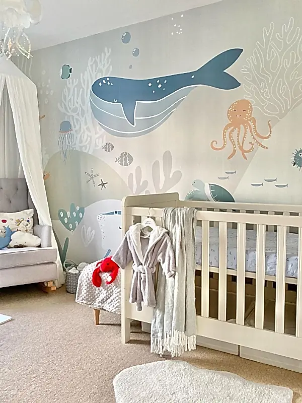 Nursery with ocean wall mural