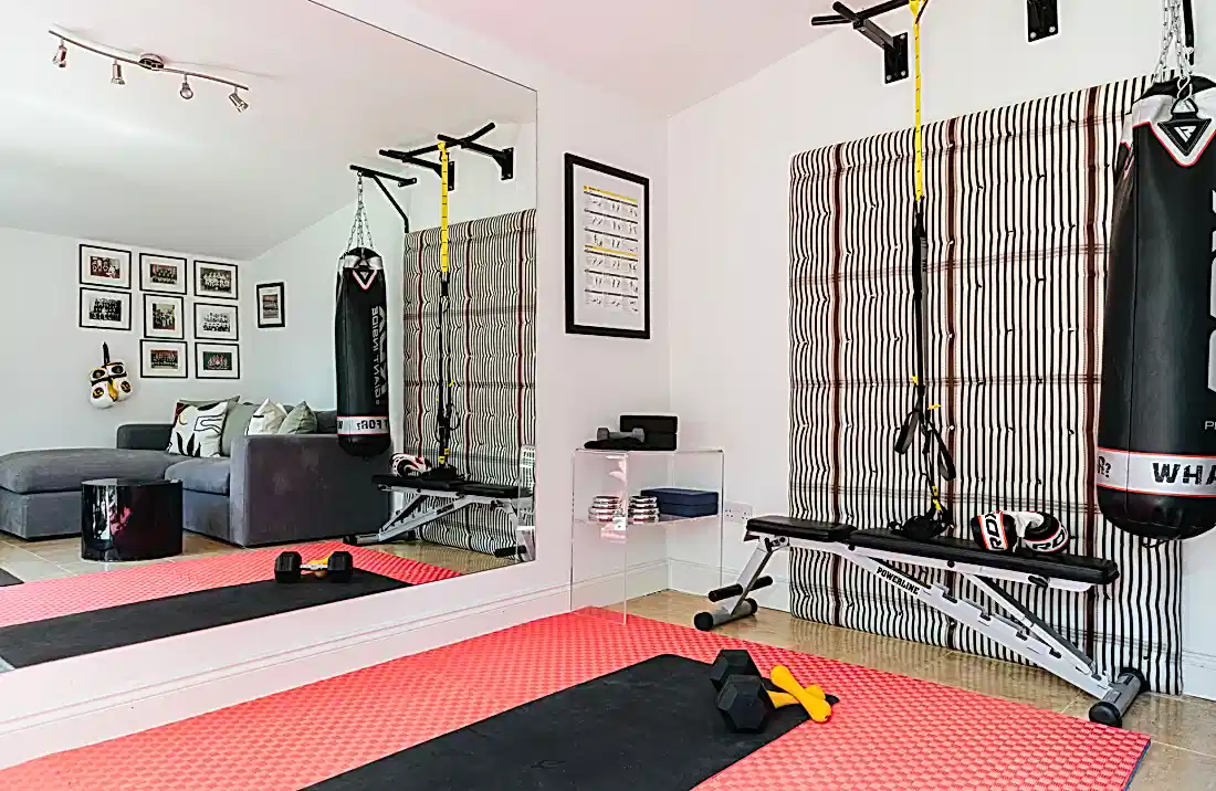 Garden room with gym equipment 
