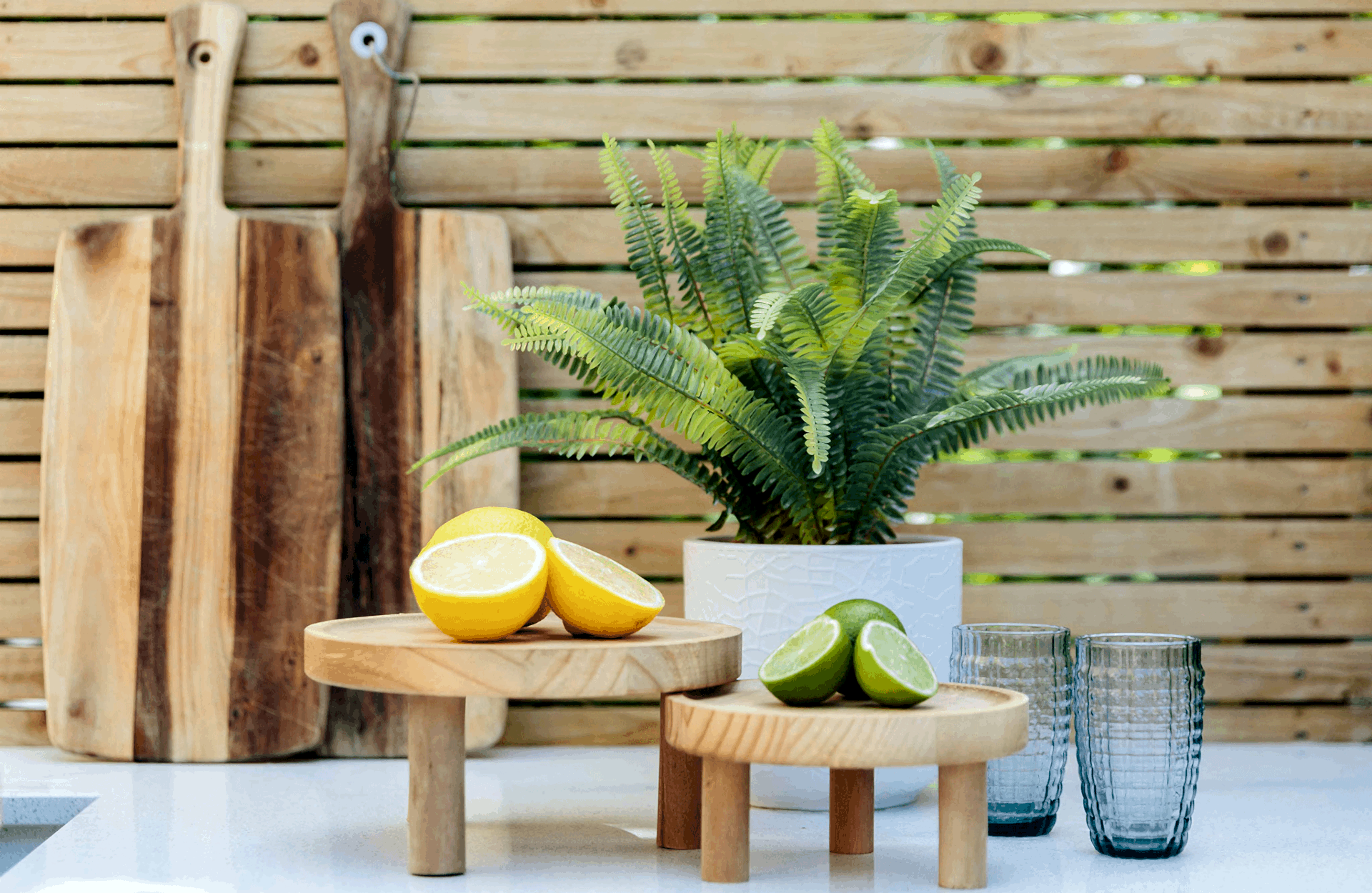 lemons and limes on a garden table