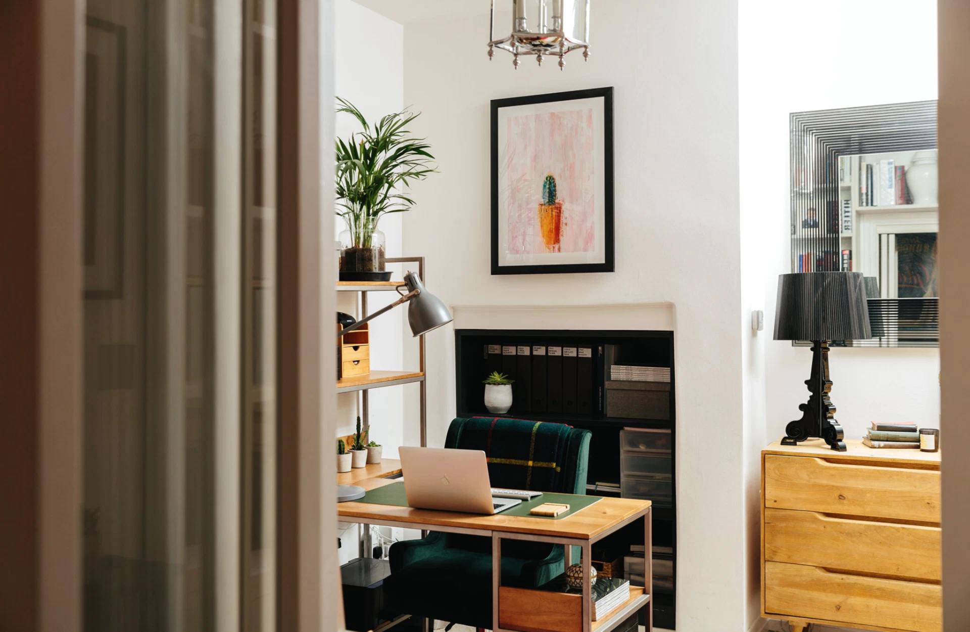 Wooden office with green chair