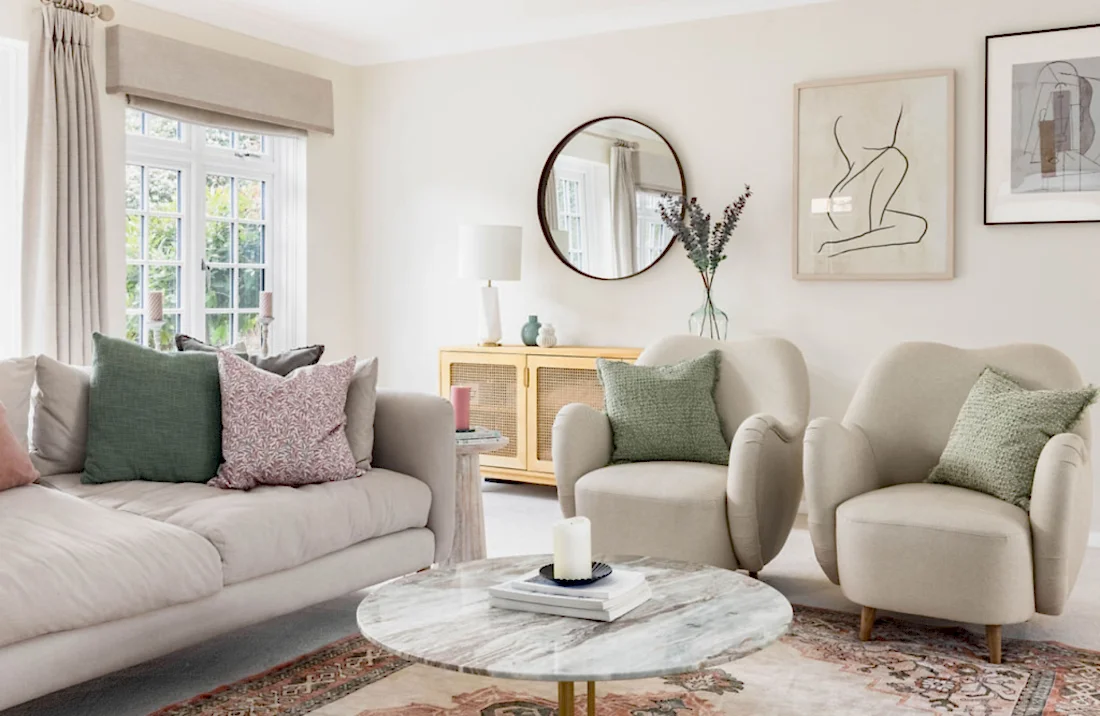 Cottage and neutral style living room with green accents