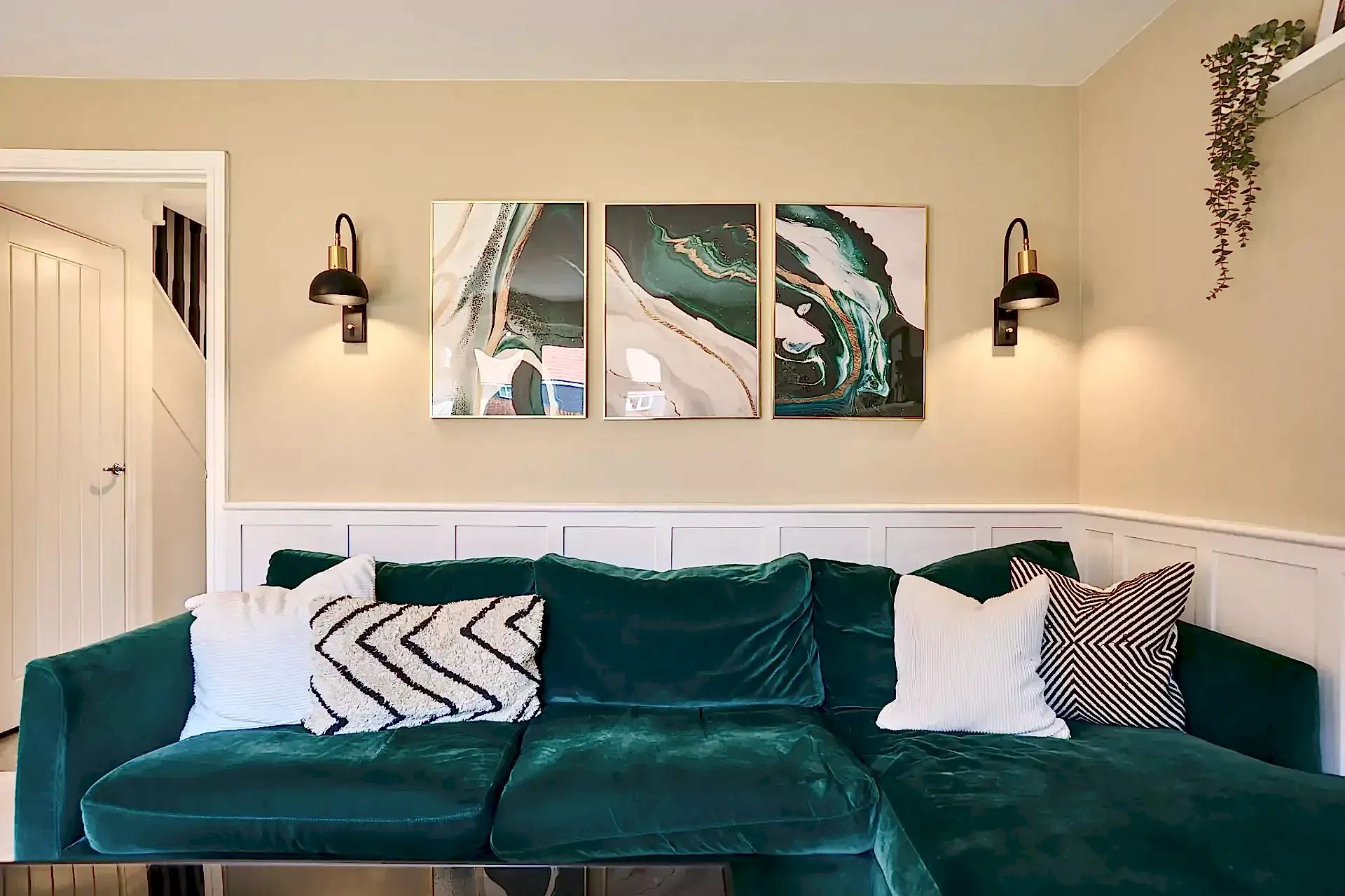 Cosy living room with emerald accents
